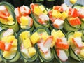 Row of salmon & tuna sushi rolls with chopsticks Royalty Free Stock Photo