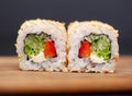 Sushi roll with salmon, cheese and cucumb Royalty Free Stock Photo