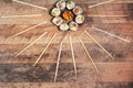 Sushi roll set with chopsticks. Japan sun concept. Royalty Free Stock Photo