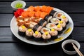 Sushi roll set in restaurant served in white plate Japan cuisine Royalty Free Stock Photo