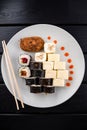 Sushi roll set in restaurant served in white plate Japan cuisine Royalty Free Stock Photo