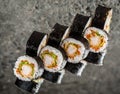 Sushi roll with shrimp, lettuce and tobiko Royalty Free Stock Photo