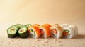 Sushi Rolls Arranged in a Vertical Gradient Transitioning from Light Cucumber Rolls to Dark Eel Rolls Royalty Free Stock Photo