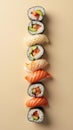 Sushi Rolls Arranged in a Vertical Gradient Transitioning from Light Cucumber Rolls to Dark Eel Rolls Royalty Free Stock Photo