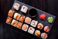 Sushi rolls assortment served on slate plate Royalty Free Stock Photo