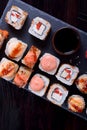 Sushi rolls assortment served on slate plate Royalty Free Stock Photo