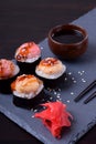 Sushi rolls assortment served on slate plate Royalty Free Stock Photo