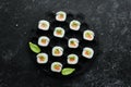 Sushi rolls with avocado and salmon. Classic Japanese sushi. Top view.