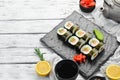 Sushi rolls with avocado and salmon. Classic Japanese sushi. Top view.