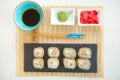 Sushi rolls on black slate surface. Japanese food. Hot fried Sushi Roll Royalty Free Stock Photo