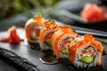 Sushi rolls on dark background. Fresh and tasty sushi rolls, Japanese cuisine, traditional delicious Japanese dish. Sushi, rolls