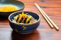 sushi rolls with fresh mango and sticky rice on ceramic bowl Royalty Free Stock Photo