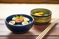 sushi rolls with fresh mango and sticky rice on ceramic bowl Royalty Free Stock Photo