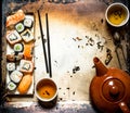 Sushi and rolls with herbal tea Royalty Free Stock Photo