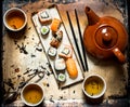 Sushi and rolls with herbal tea Royalty Free Stock Photo