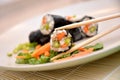 Sushi rolls japanese dish asiatic food white rice vegetables