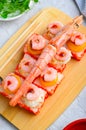 Sushi Rolls with Langoustine and Shrimps, Baked Sushi Rolls Seafood and Crab, Cream Cheese Topped Royalty Free Stock Photo