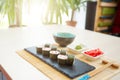 Sushi rolls, maki, nigiri Set served for two on black stone slate on dark background copy space Royalty Free Stock Photo