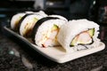 Sushi rolls on marble table Royalty Free Stock Photo