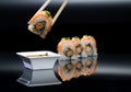 Sushi rolls over black Royalty Free Stock Photo