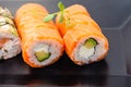 Sushi rolls philadelphia with salmon, cream cheese, avocado