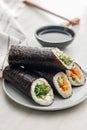 Sushi rolls on Plate with bowl of soy sauce and chopsticks Royalty Free Stock Photo