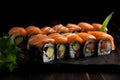 Sushi rolls with salmon and avocado on black stone dish close-up. Dark background. Still life. Food background. Image is AI Royalty Free Stock Photo