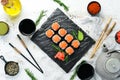 Sushi rolls with salmon and caviar. Traditional Japanese cuisine. Royalty Free Stock Photo