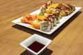 Sushi rolls of salmon and other fish on the table Royalty Free Stock Photo