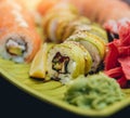 Sushi and rolls with salmon, prawn, avocado, cream cheese. Royalty Free Stock Photo