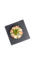 Sushi rolls set on black board on isolated white background Royalty Free Stock Photo