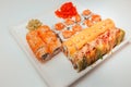 Sushi rolls set served on white plate Royalty Free Stock Photo