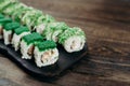 Sushi rolls set served on wooden tray, copy space Royalty Free Stock Photo