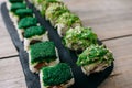 Sushi rolls set served on wooden tray Royalty Free Stock Photo