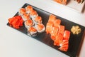 Sushi rolls set served on white plate Royalty Free Stock Photo