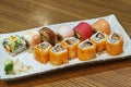 sushi rolls set on wooden table at Japanese restaurant Royalty Free Stock Photo