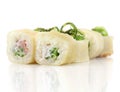 Sushi rolls with shrimp, cheese, tuna, wakame seaweed