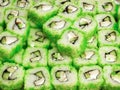 Sushi rolls with smoked fish, avacado and caviar.