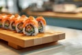 Sushi rolls on a tray in restaurant. Fresh and tasty sushi rolls, Japanese cuisine, traditional delicious Japanese dish. Sushi, Royalty Free Stock Photo