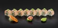 Sushi rolls. Uramaki maki sushi with sliced green pepper Royalty Free Stock Photo