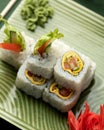 Sushi rolls. Vegetarian inside out sushi with fresh vegetables. Asian or Japanese food, Oriental cuisine. Close up shot Royalty Free Stock Photo