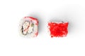 Sushi rolls with white fish, cucumber and tobiko caviar isolated on white background. Royalty Free Stock Photo