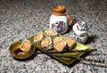 Sushi,sake on a grnite counter Royalty Free Stock Photo