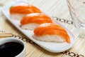 Sushi sake nigiri with salmon served on platter
