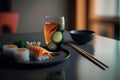 Sushi set on a black plate with chopsticks and soy sauce Royalty Free Stock Photo