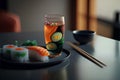 Sushi set on a black plate with chopsticks on a table Royalty Free Stock Photo