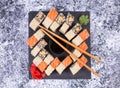 Sushi set on black stone plate. Japanese sushi food. Royalty Free Stock Photo