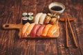 Sushi Set. Different kinds of sushi rolls on wooden serving board Royalty Free Stock Photo