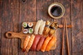 Sushi Set. Different kinds of sushi rolls on wooden serving board Royalty Free Stock Photo
