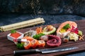 Sushi Set. Different sashimi, sushi and rolls with octopus